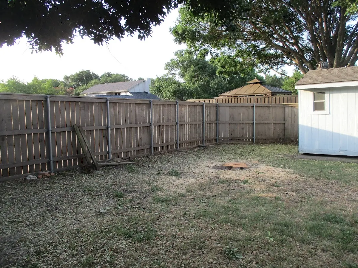 Cleared yard after professional tree removal in Fort Towson